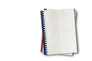 Top view of old plastic ring binding notepad paper files isolated on white background with clipping path, horizontal format. photo