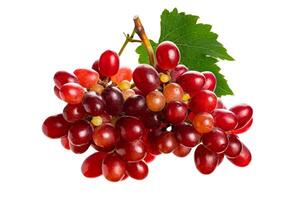 Bunch of ripe red grapes with green leaf isolated on white background with clipping path. photo