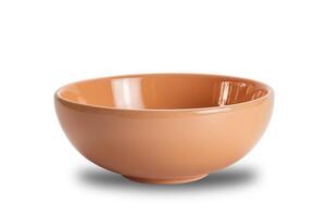 Closeup view of new empty brown ceramic bowl isolated on white background with clipping path. photo