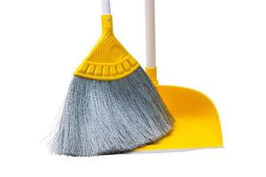 Long handle yellow broom and dustpan isolated on white background with clipping path. photo