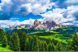 Landscape of the famous Seiser Alm with the beautiful Langkofel Group of the Dolomites in South Tyrol, Italy photo