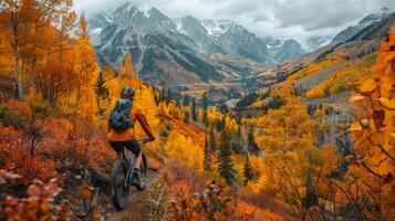 ai generado un montaña motorista navegando un rocoso camino, rodeado por vibrante otoño hojas foto