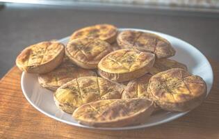 Baked potatoes in the oven with spices photo