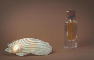 A bottle of perfume on the background of a large seashell. photo