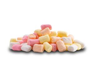 Side view pile of multicolor marshmallow isolated on white background with clipping path. Confectionery called marshmallow made from gelatin sugar and water. photo