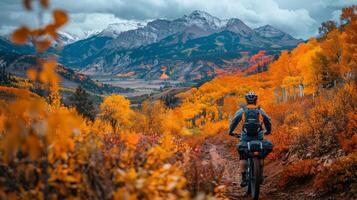 ai generado un montaña motorista navegando un rocoso camino, rodeado por vibrante otoño hojas foto