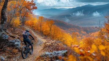 ai generado ciclista montando mediante un escabroso montaña camino, con vibrante otoño follaje creando foto