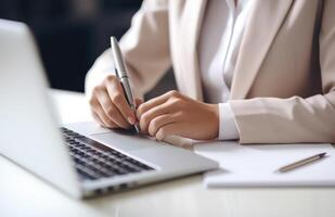 AI generated a young woman writing notes by a desk with laptop photo