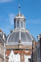 Street to the Oostkerk octagonal domed church in Middelburg Netherlands photo