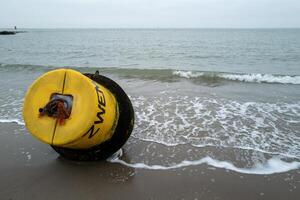 Offshore buoy was floated ashore photo