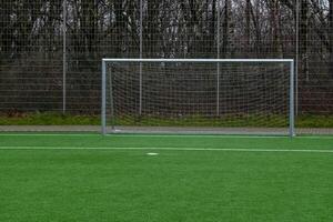 soccer pitch, center circle and goal photo