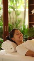AI generated Relaxed Asian woman enjoying a spa day with a serene smile photo