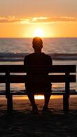 AI generated Silhouette of a person sitting on bench at sunset photo