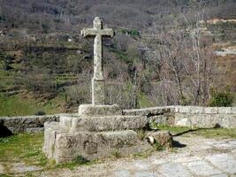 Stone cross on the Roman road photo