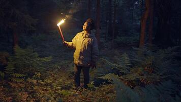 Fearless Female Person Holding Flaming Burning Torchlight Walking Outdoors video