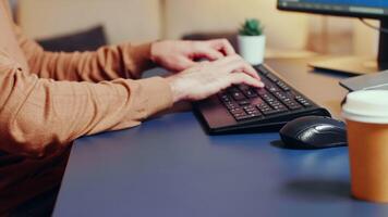 Zoom in shot of creative game developer typing on keyboard. video