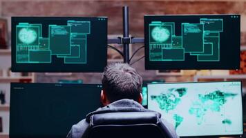 Back view of cyber criminals get access denied while hacking the government. video