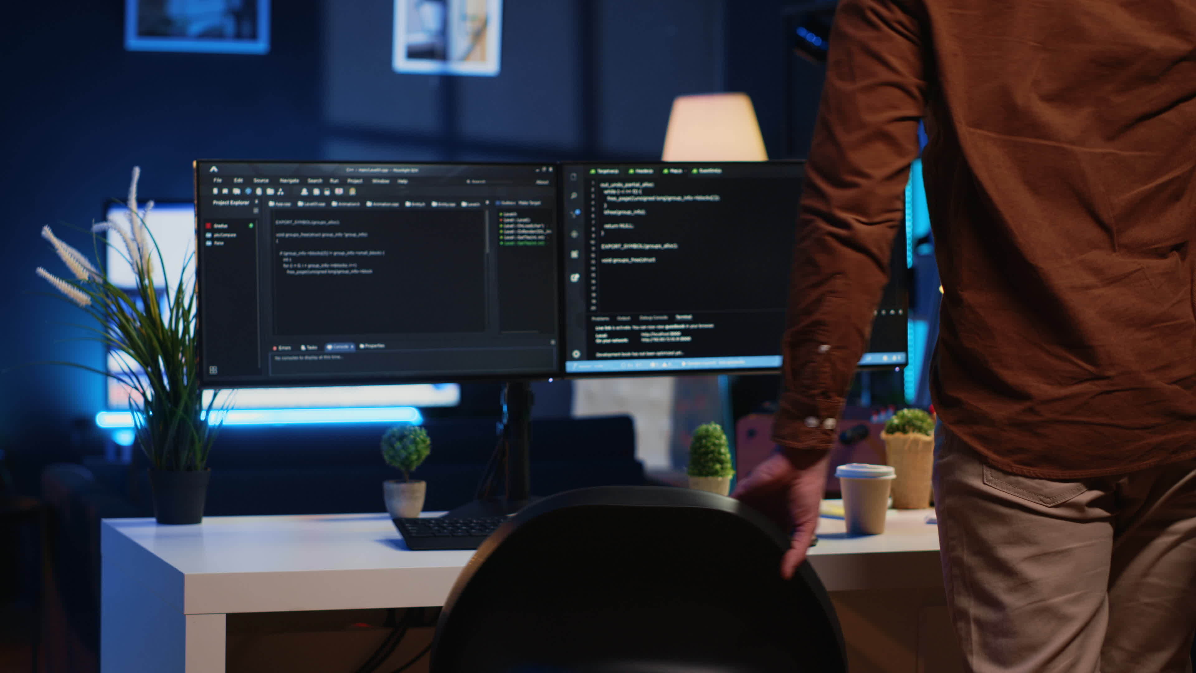 Remote software developer arriving in personal office at home, starting ...