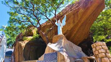 Bell Rock Along with a Statue - Leftwards Shot video