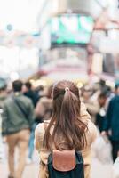 Tourist woman visit Ameyoko market, a busy market street located in Ueno. Landmark and popular for tourist attraction and Travel destination in Tokyo, Japan and Asia concept photo