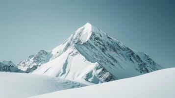 AI generated mountain peak, with snow-capped slopes and a clear blue sky, emphasizing the grandeur photo