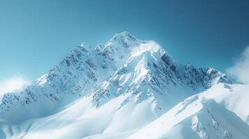 AI generated A mountain peak with snow-capped slopes and a clear blue sky, emphasizing the grandeur photo