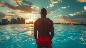 AI generated a lifeguard in red shorts, taking a momentary pause to gaze at the city skyline photo