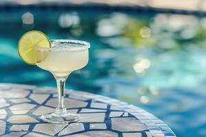 AI Generated Classic margarita cocktail by the poolside, copy space photo