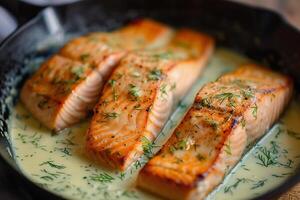 AI Generated Pan seared salmon fillets in creamy dill sauce, cooked in pan photo