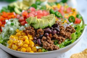 AI Generated Mexican taco salad with ground beef and Fresh vegetables photo