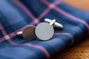 AI Generated Classic round silver cufflinks on elegant blue checkered tie photo