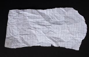 Isolated ripped paper piece. Torn blank paper with edges. photo