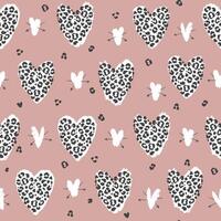 Seamless pattern with leopard print and hearts. Vector illustration.