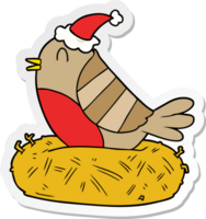 hand drawn sticker cartoon of a bird sitting on nest wearing santa hat png