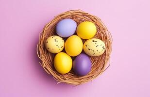 AI generated colorful easter eggs nestled in a wicker basket on pink background photo