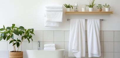 AI generated white towels hanging on a towel rack in a modern bathroom photo