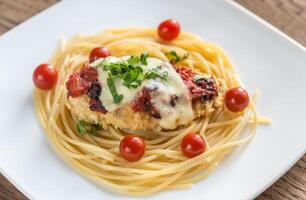 Baked chicken with parmesan and mozzarella photo