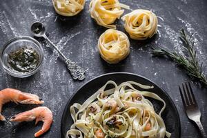 Tagliatelle pasta with seafood photo