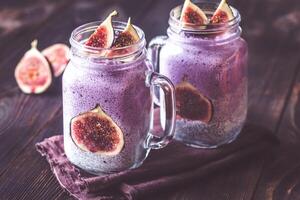 Chia seed puddings with fig slices photo