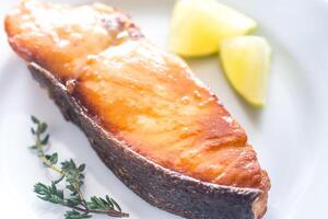 Roasted fish steak photo