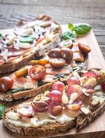 Bruschetta with different toppings photo