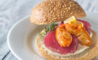 Sandwich with tuna, crab claw and mozzarella photo