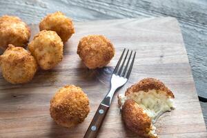 Arancini - rice balls with mozzarella photo