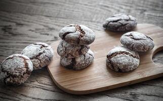 Chocolate cookies on the wooden board photo