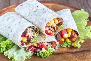 Four chicken burritos photo