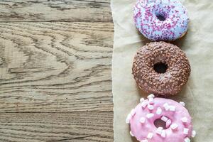 Colourful donuts arranged in a row photo