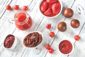 Assortment of products made of tomatoes photo