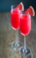 Two glasses of Mimosa cocktail photo