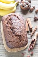 Loaf of banana-chocolate bread with chocolate cream photo