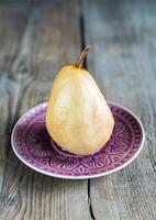Pear poached in white wine photo